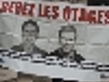 Rally in Paris for kidnapped French journalists