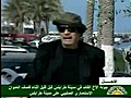 Gaddafi cheered in surprise trip through Tripoli