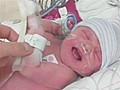 Mom gives birth while home alone