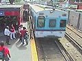 Raw Video: Train Spares Girl Lowered Onto Tracks