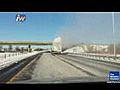 Snow Falls Off Truck On Highway