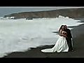 Young married couple on the beach