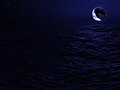 (1029) Eclipse Blue Moon Over Night Ocean Adn Meteorite Stock Footage