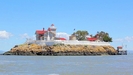 Couple Run Lighthouse Inn on Tiny Island