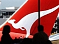 Qantas says business travel picking up