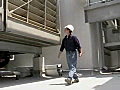 Royalty Free Stock Video SD Footage General Contractor Walks by HVAC Equipment on the Roof of a Construction Site in Downtown Ft. Lauderdale,  Florida