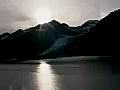 Royalty Free Stock Video SD Footage Mountains and Bright Sun in College Fjord,  Alaska