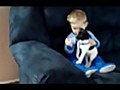 Kid Shares Candy with Puppy