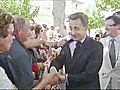 Man grabs Sarkozy and is wrestled to the ground