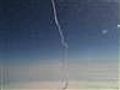 Plane passenger snaps photo of shuttle liftoff
