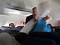 Pillow fight breaks out mid-flight