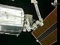 Discovery crew takes final spacewalk