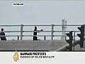 Bahrain protesters hit by tear gas
