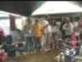 Rain Can't Dampen Spirit Of Country Music Fans