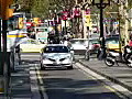 Royalty Free Stock Video HD Footage Zoom Out to Car Traveling on a Street in Barcelona,  Spain