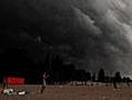 Creepy cloud envelopes beach in minutes