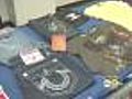 Phony iPhones,  Counterfeit Goods Seized In Sweep