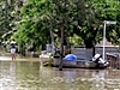 Woman found dead in flooded Qld