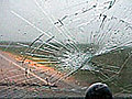 Caught on cam: Hail shatters window