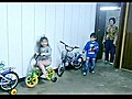 Little Girl Drifts Toy Bike