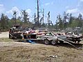 Debris From Tornado Damage Hauled Away