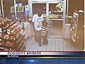 Surveillance Video Shows Dad Robbing Store With Child