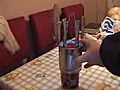 Home made tin can stirling engine work with hot water