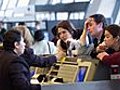 Americans Enjoying Thanksgiving Tradition Of Sitting Around At Airport
