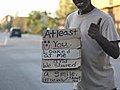 Homeless man has the best sign