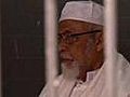 Bashir walks out of trial