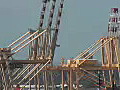 Royalty Free Stock Video HD Footage Close Up of Large Port Cranes at the Port of Honolulu in Hawaii