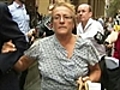 Mum of baby killer Lane weeps in court