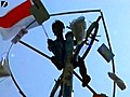 Indonesians Climb Greasy Poles