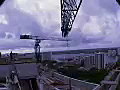 Royalty Free Stock Video SD Footage Tower Crane and Workers on Roof of a Construction Project in Miami,  Florida