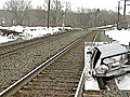 Woman Narrowly Escapes Tragedy on Train Tracks