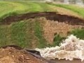 River levee crumbles on camera