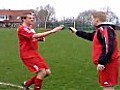 German amateur footballer takes a phone call during the game