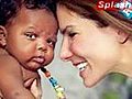 SNTV - Sandra Bullock announces adoption