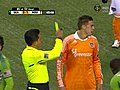 YELLOW CARD: Zakuani draws foul on Cameron