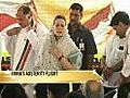 Sonia flies economy,  Rahul to take train