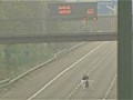 Extreme ironing: man presses shirt on M1 motorway