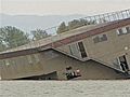 Barge Carrying House Stuck In River