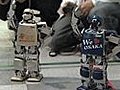 Robot marathon tests human,  mechanical stamina