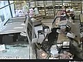 Woman Crashes Into Store