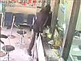 Bank Robber Spends 5 Minutes Smashing Hole In Reinforced Glass