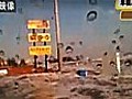 Japan driver films his car being engulfed by tsunami