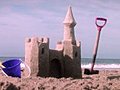 (1001) Sandcastle On The Beach With Toys Stock Footage