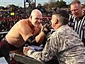 WWE Extras - Kane Challenges Maj. Gen. Will Grimsley to an Arm Wrestling Contest