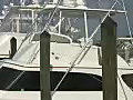 Royalty Free Stock Video HD Footage Pan Up to Rigging and Boats Docked at a Marina in Jupiter,  Florida
