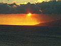 Royalty Free Stock Video SD Footage Zoom Into Sunset and Molokai Island From the North Shore Coastline in Maui,  Hawaii